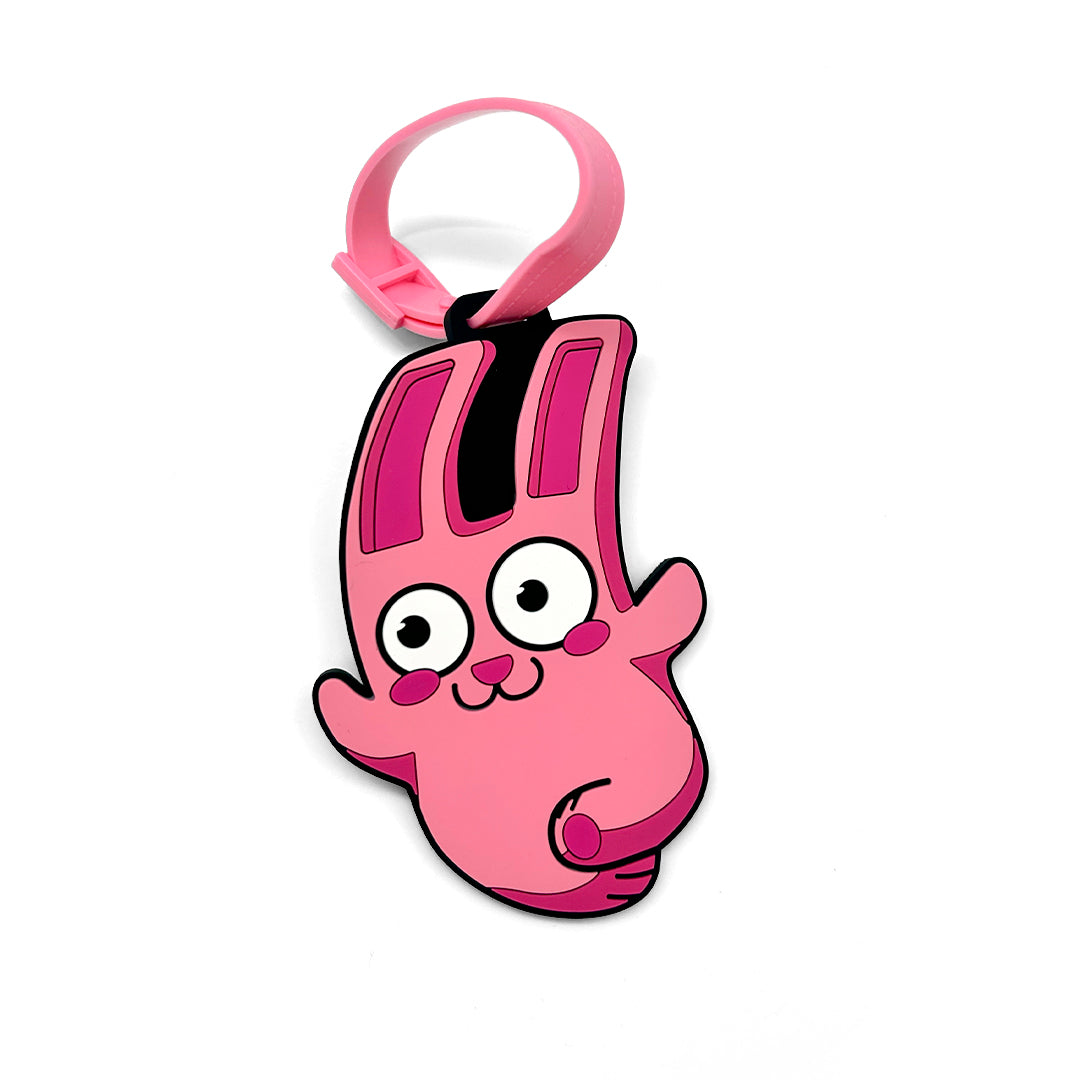 Pink cartoonish luggage tag with a white background