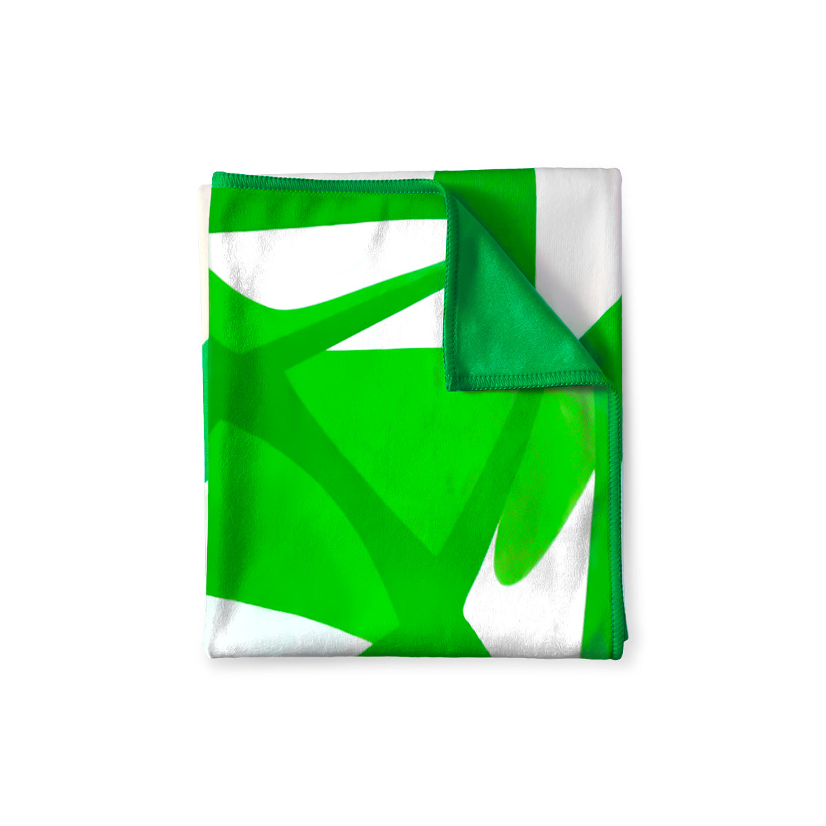 A folded throw blanket featuring a bold, abstract geometric pattern in vibrant lime green and white, with a solid green reverse side, shown on a plain white background.
