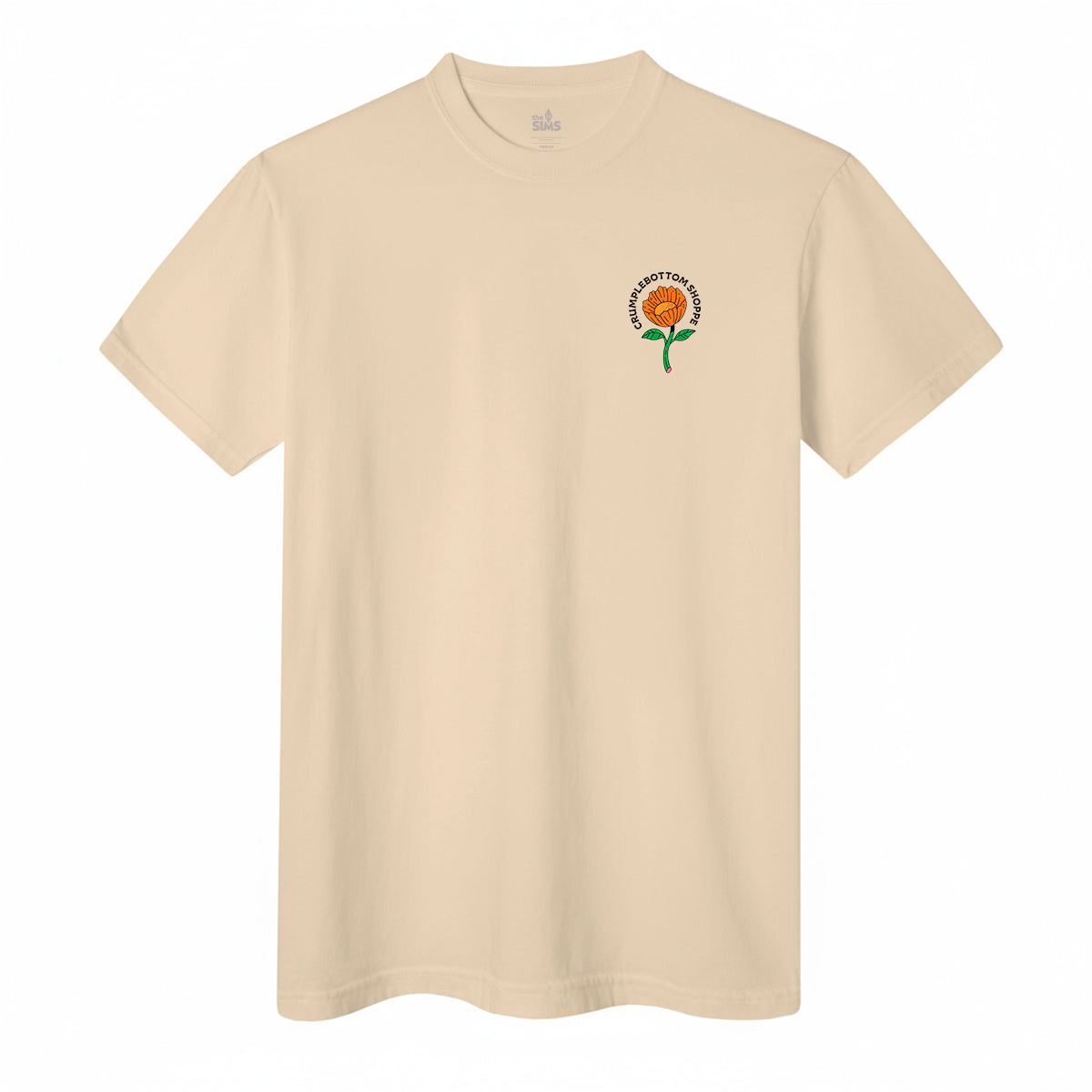 A light beige crewneck t-shirt with a small graphic on the left chest featuring an orange flower with a green stem and the text 'WATERFOWL MANAGEMENT ASSOCIATED'.