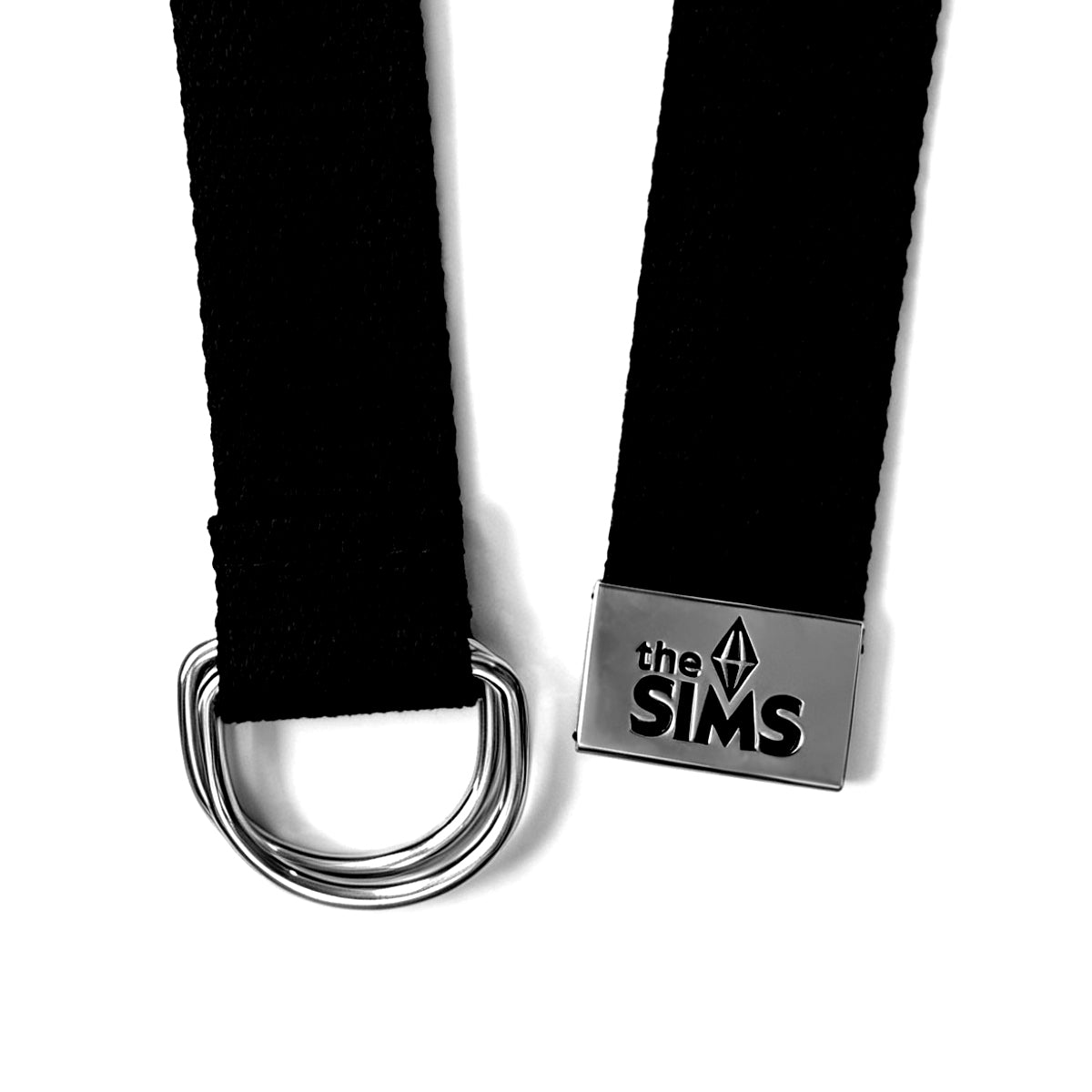 A black woven belt with a silver metal D-ring and a rectangular metal buckle engraved with 'the SIMS' logo, shown on a plain white background.