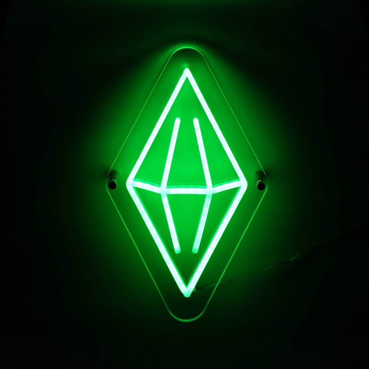 Neon green sign with a geometric design on a black background