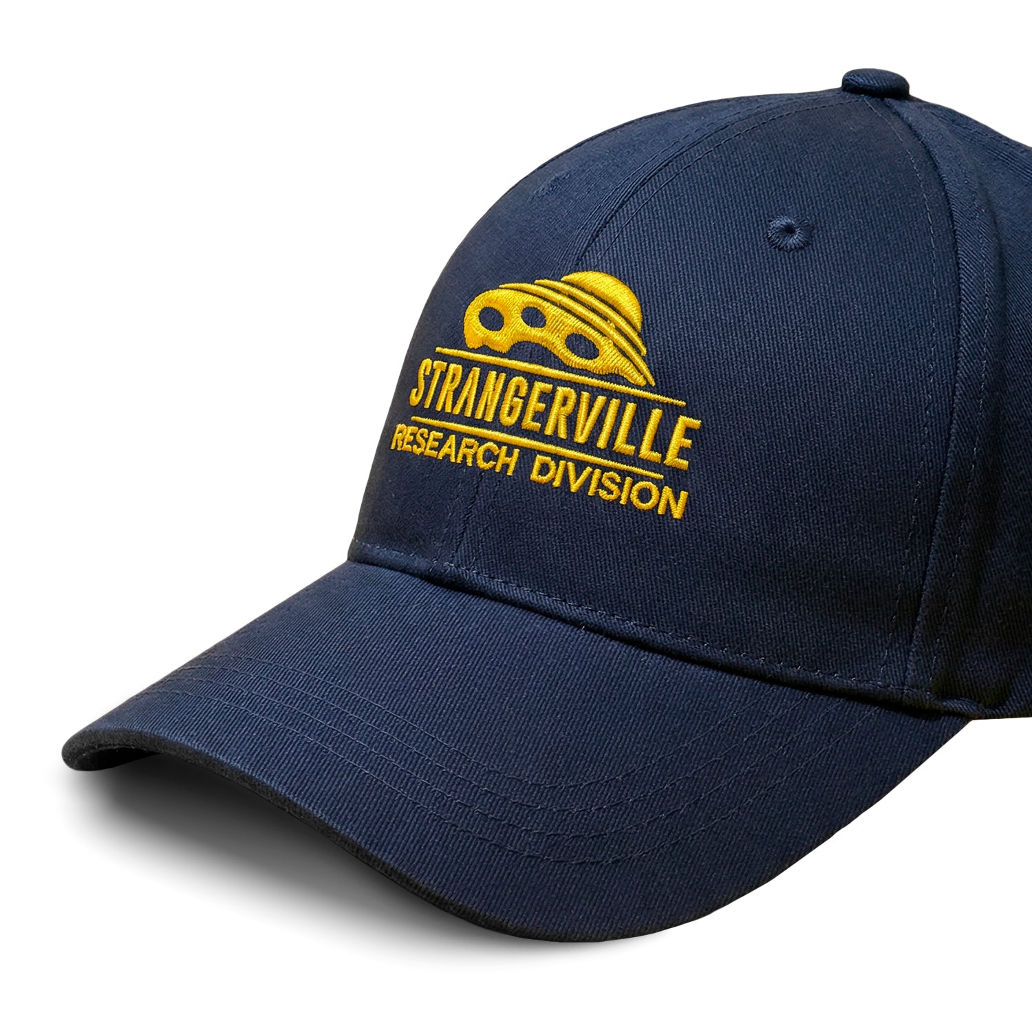 Navy blue cap with yellow 'Strangerville Research Division' logo on a white background